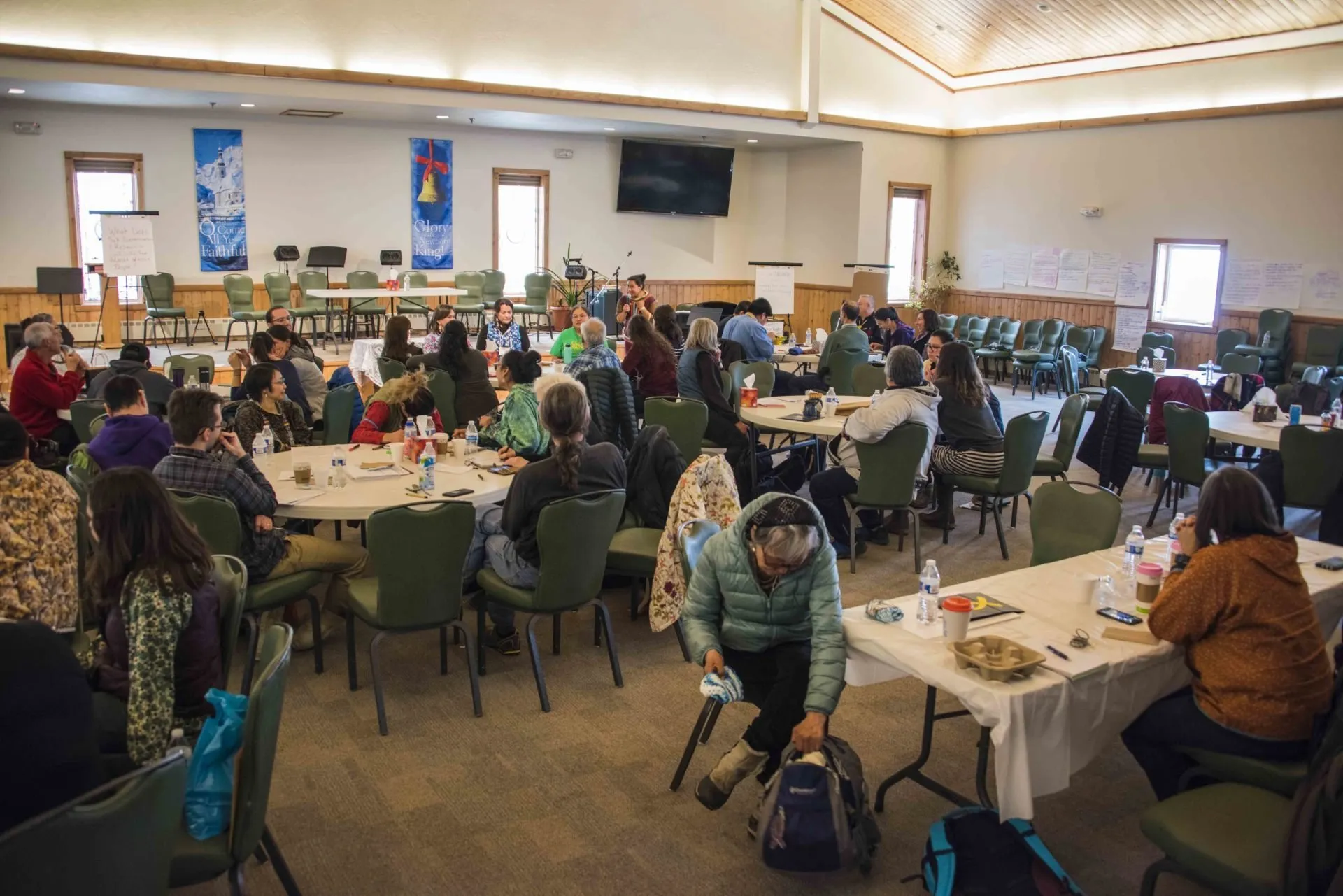 Everyone eating lunch during a breakout.