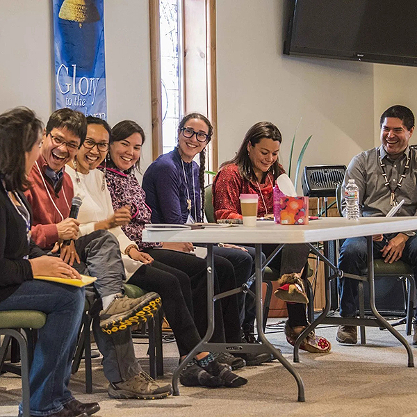 PhD panel up on stage.