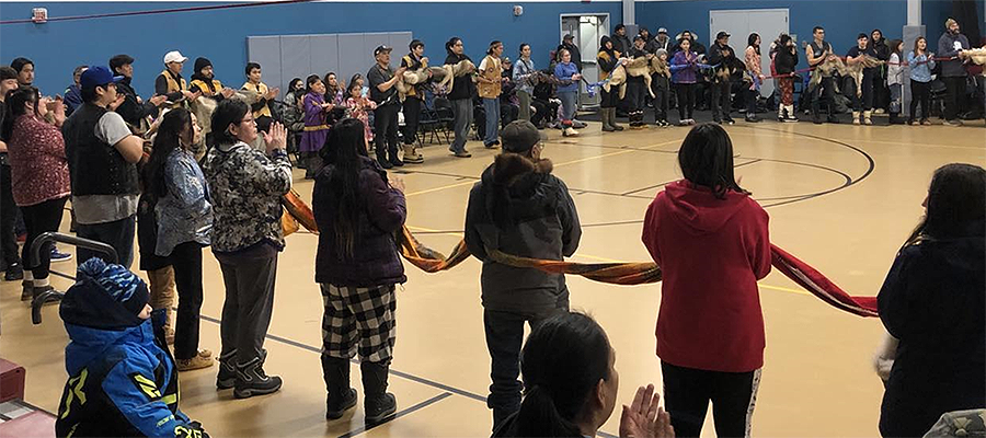 Community gathering in school gym