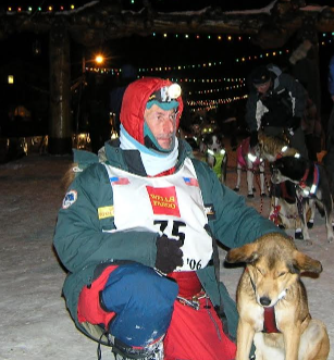 Dr. Jacques Philip with sled dog