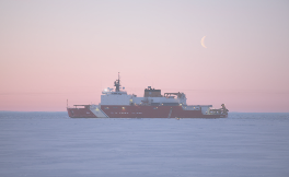 Icebreaker ship in frozen Arctic waters
