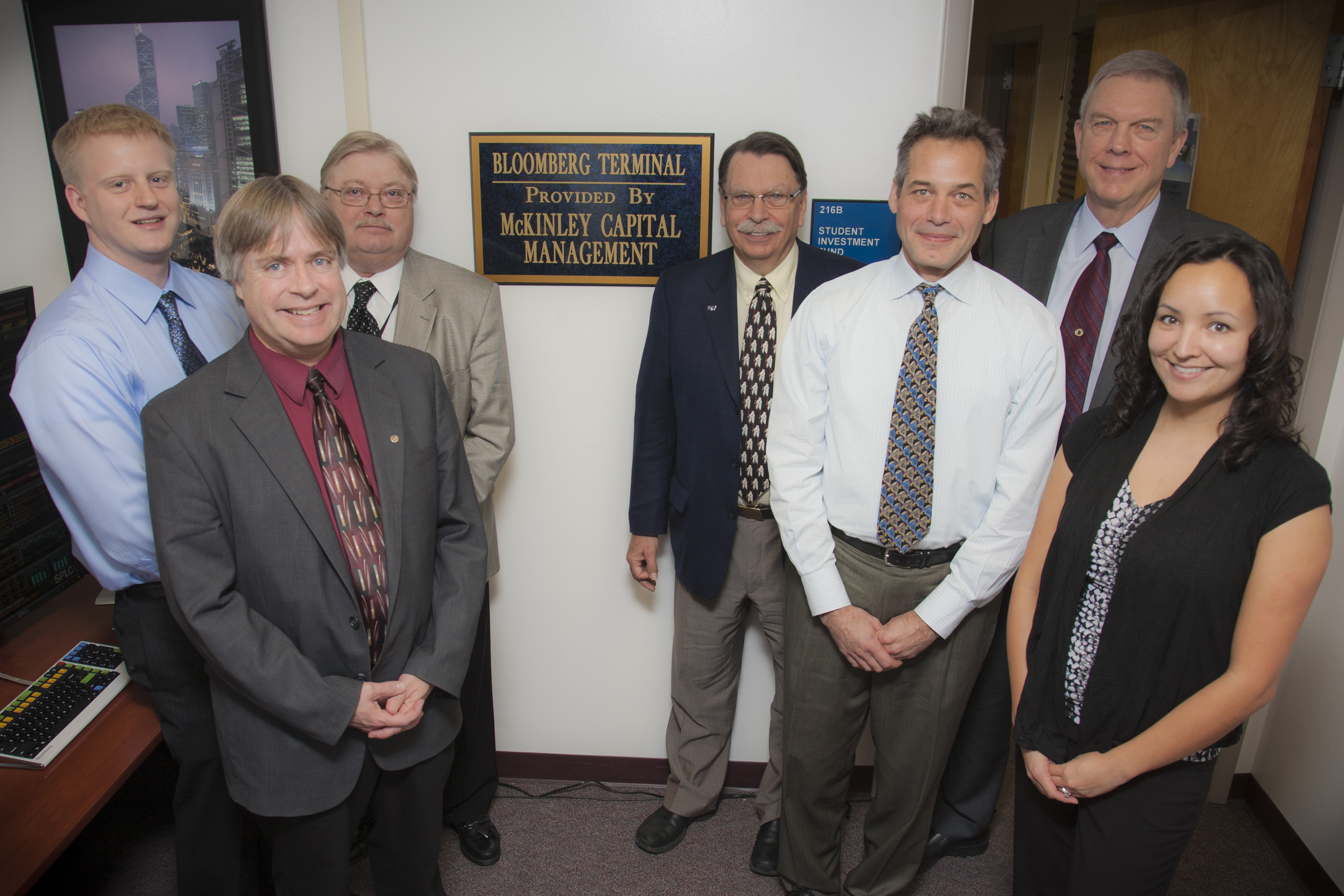 (L to R) student Joey Shinn, SOM Dean Mark Herrmann, McKinley Capital Mgmt, LLC President/CEO Bob Gillam, Chancellor Brian Rogers, Professor Craig Wisen, UA President Pat Gamble, and student Abigail Scannell Riggs.