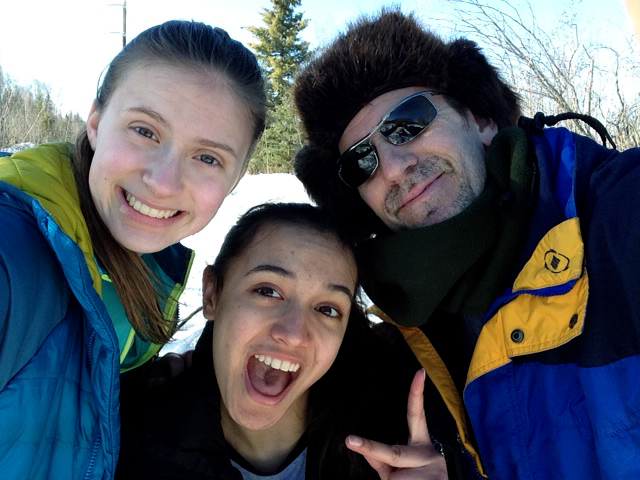 Tim snow-machining with his daughter, Kaylee (left), and Kaylee's friend