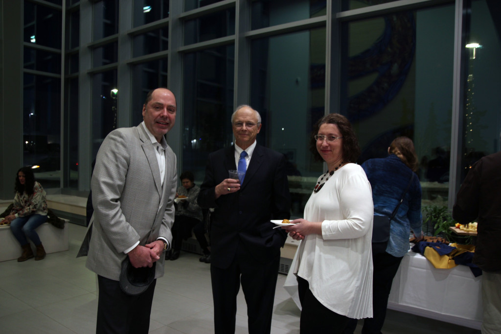 Jim Hasle and Garry Hutchison join Candace Crews, former GAAP member and seminar originator, during the social hour before the seminar