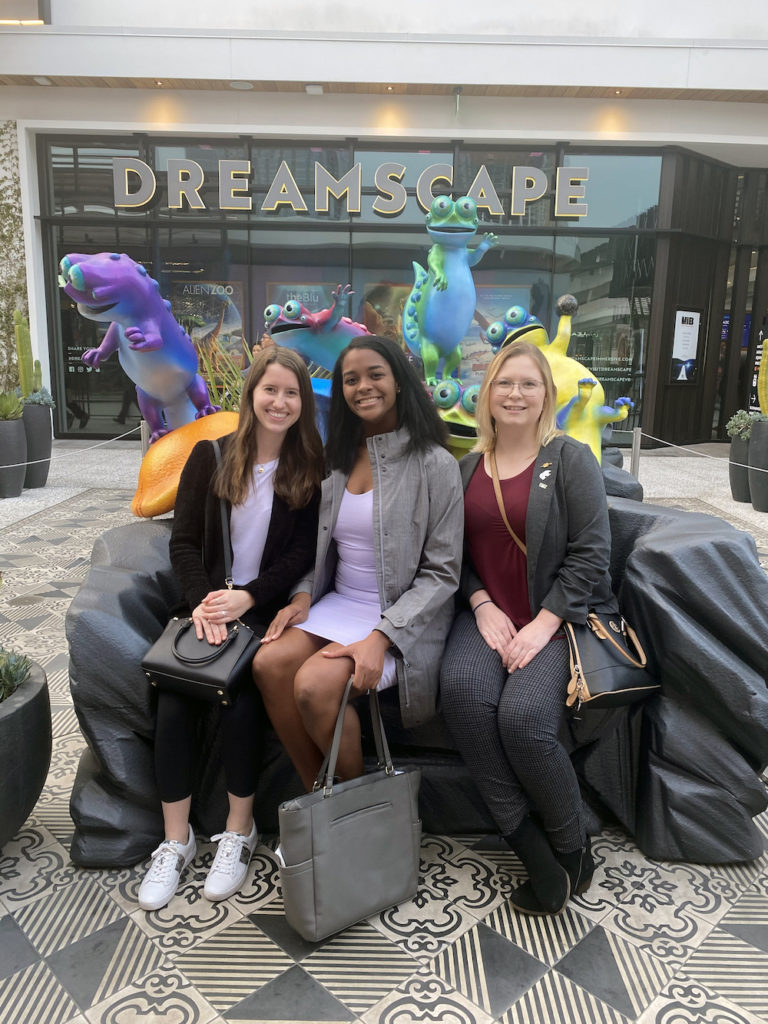 Students Smiling in front of dreamscape