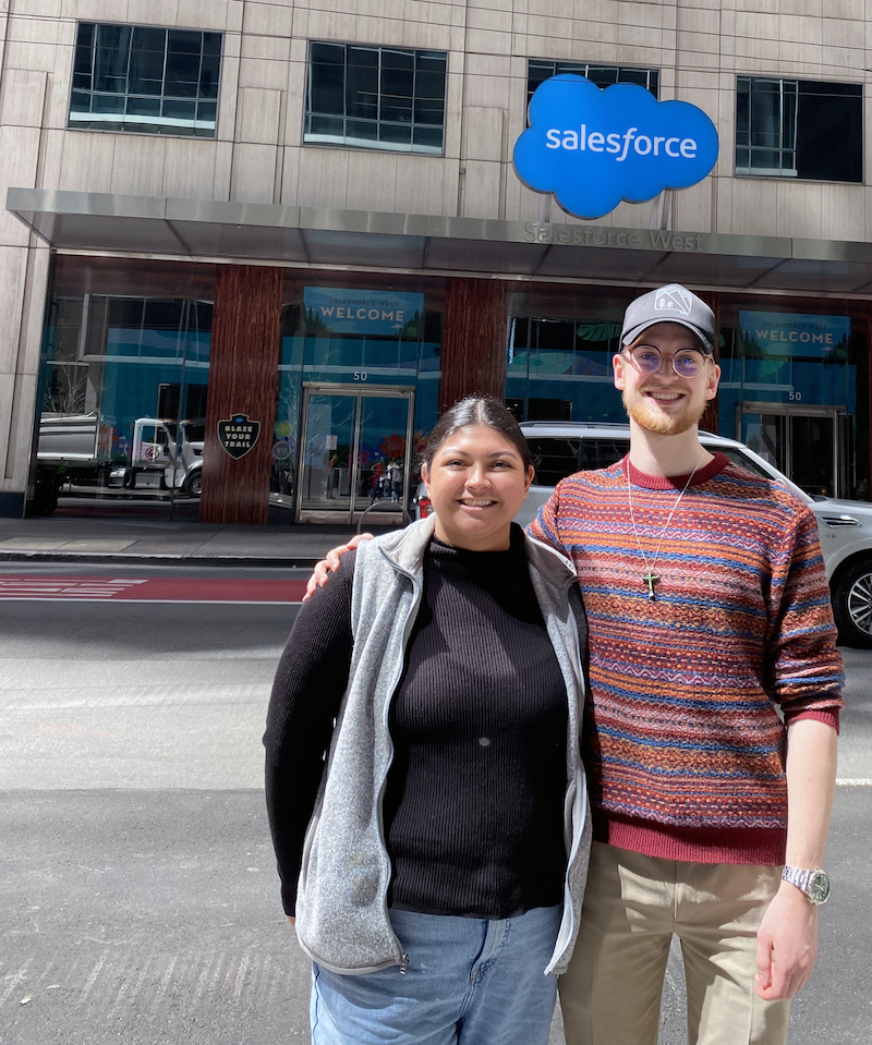Two students standing outside