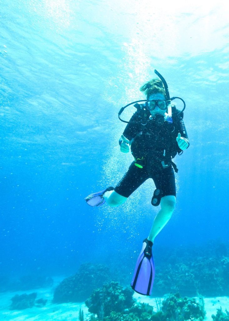 Mickela diving in the Honduras