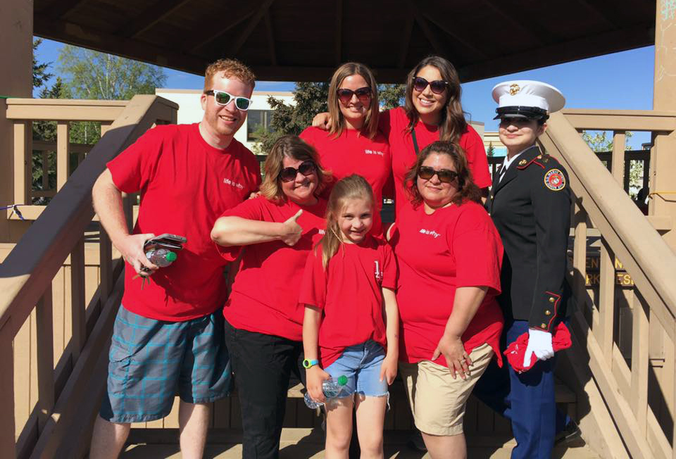 Micaiah participates in the annual American Heart Association Heart Walk with co-workers.