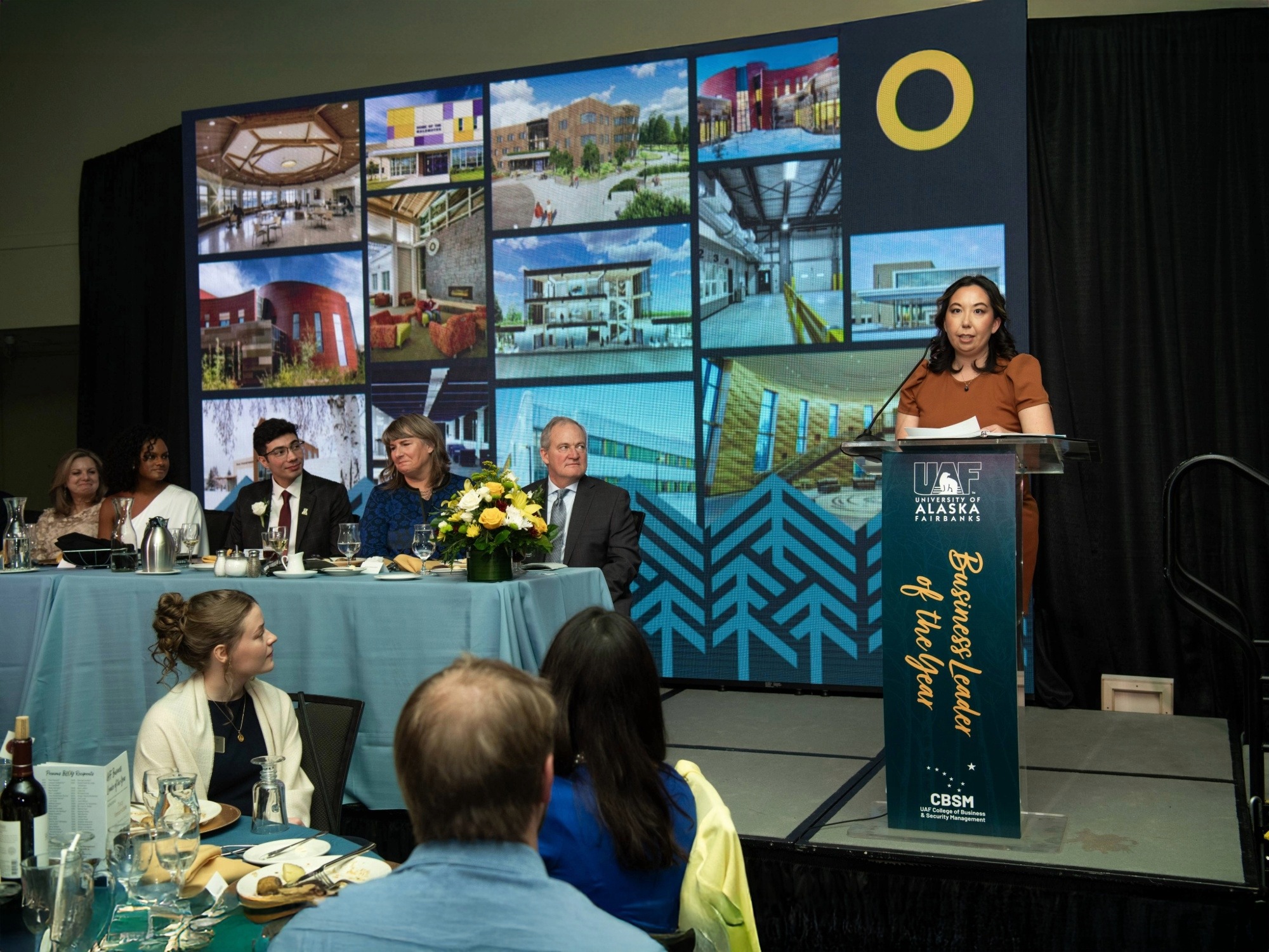 Tara McGrogan speaking at the 2024 Business Leader of the Year event celebrating Tracy Vanaisdale  