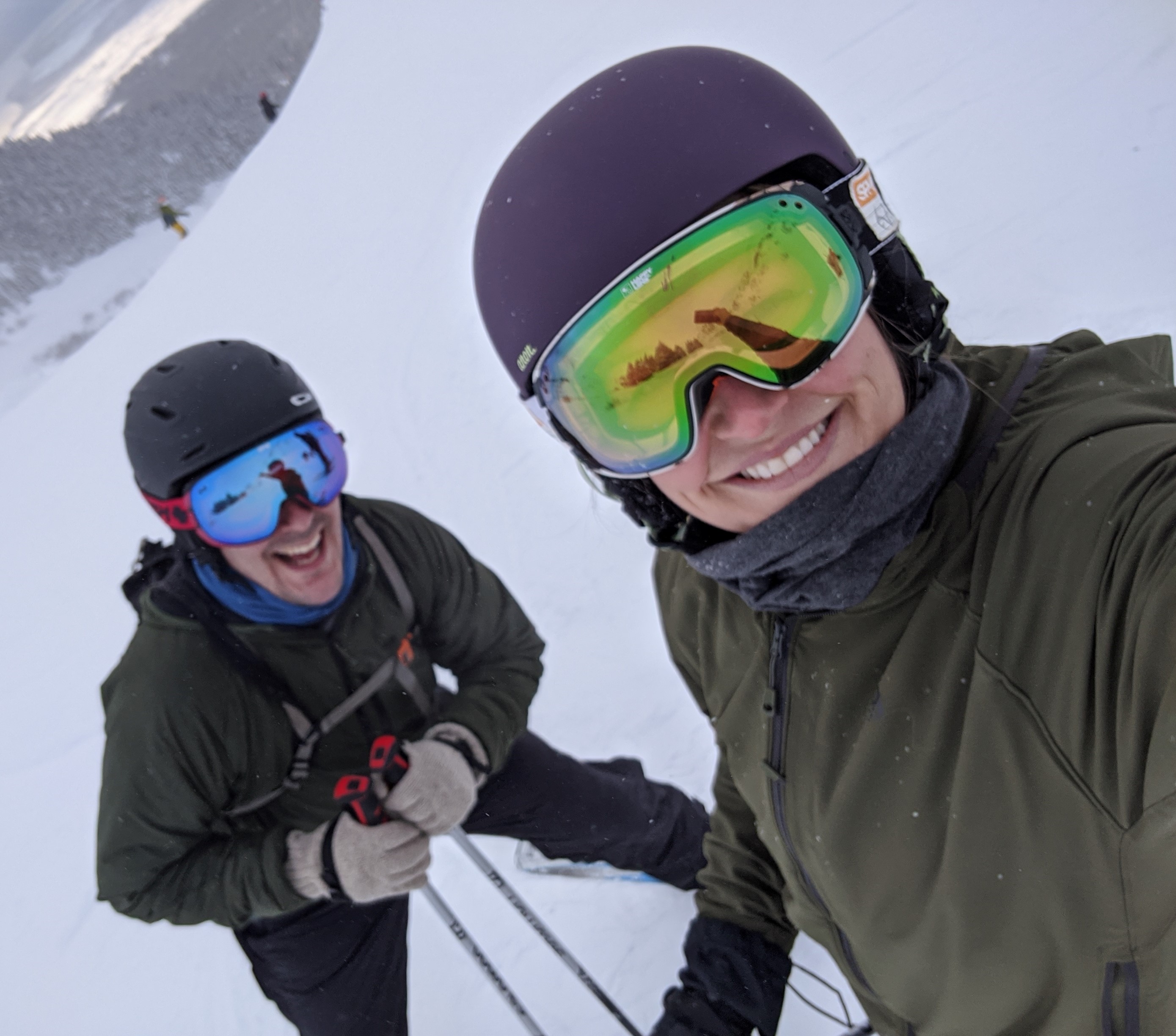 Couple take selfie on mountain skiing 