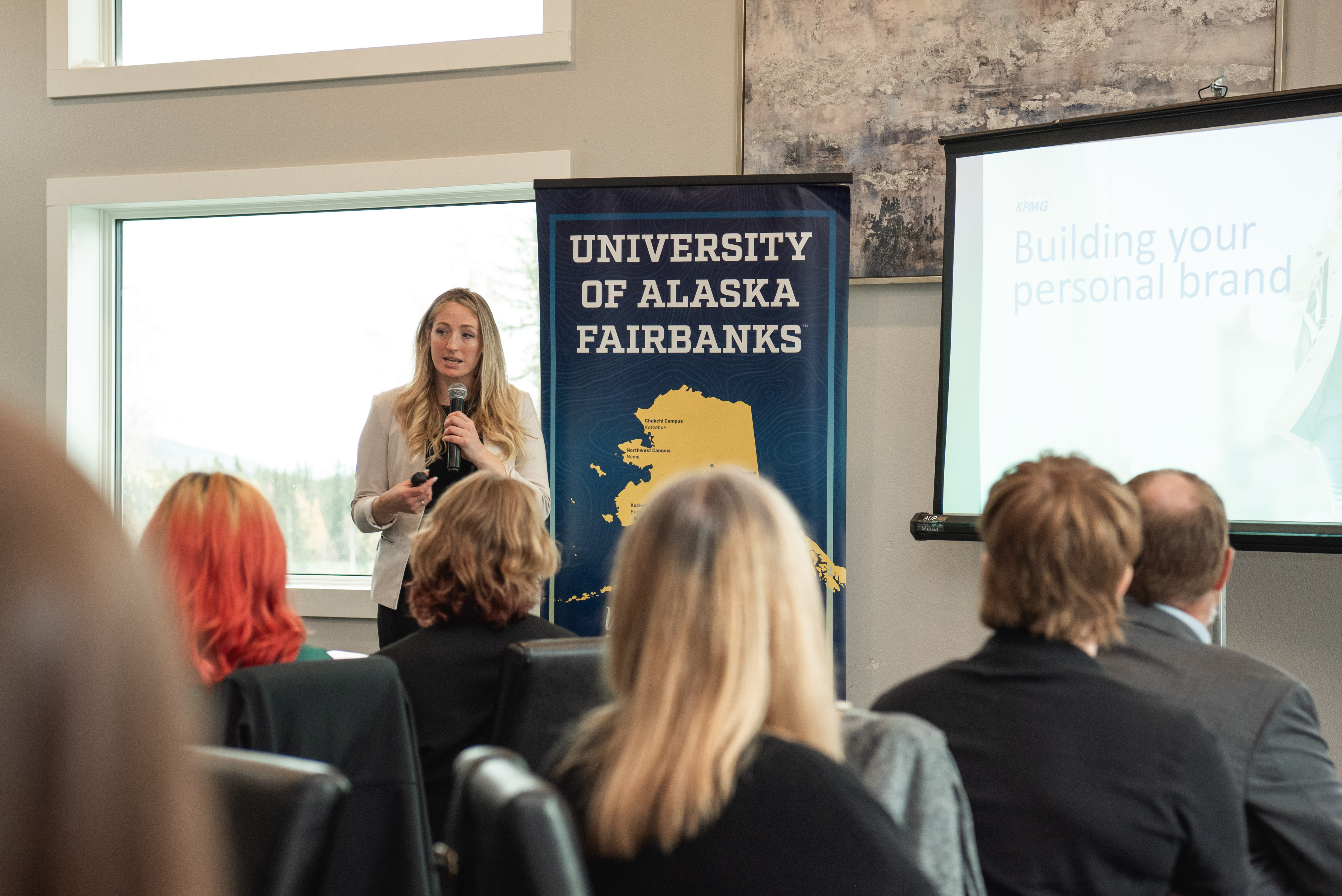Presenting sponsor speaks to room of students 