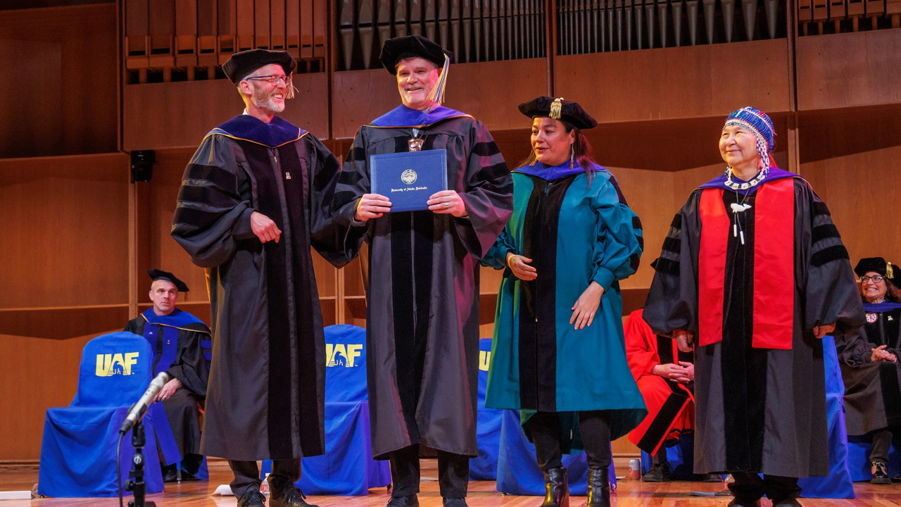 John Pennington in regalia at UAF PhD hooding ceremony.
