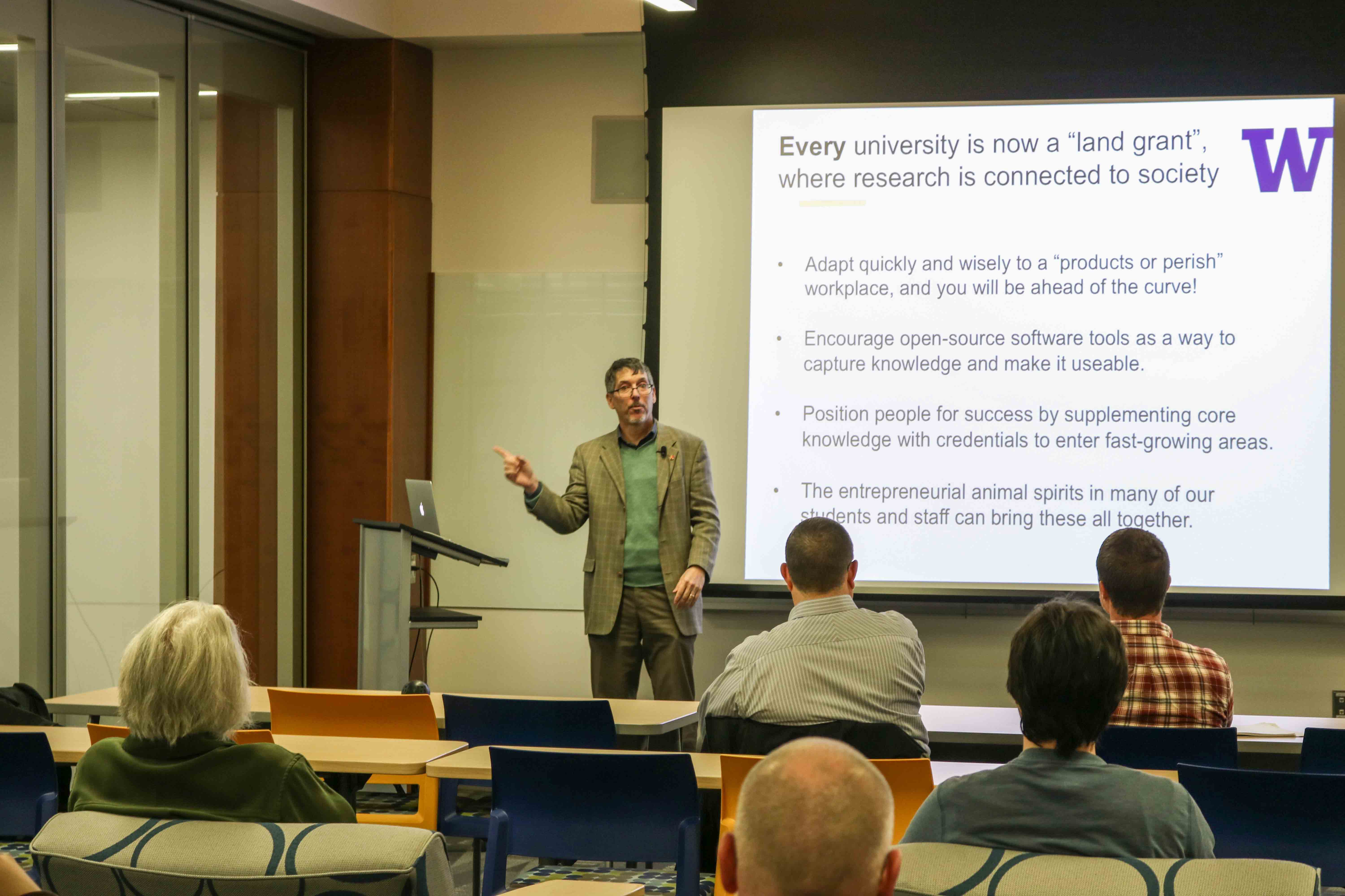 Dan Schwartz presents at the January I2 event in the BP Design Theater. Photo by Amanda Byrd/OIPC.