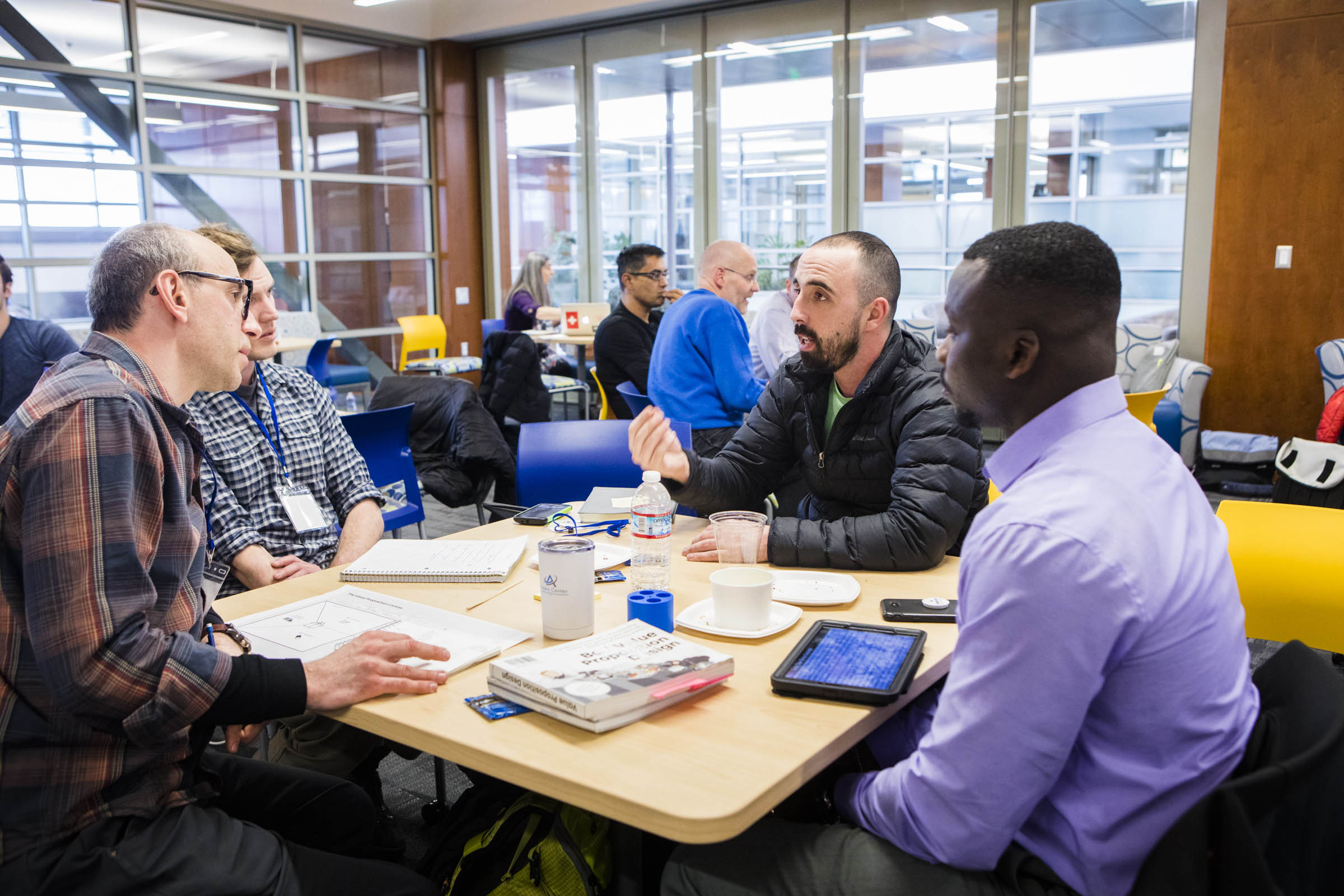 A team discusses its innovation during the 2018 Lean Launch Workshop. Photo by JR Ancheta