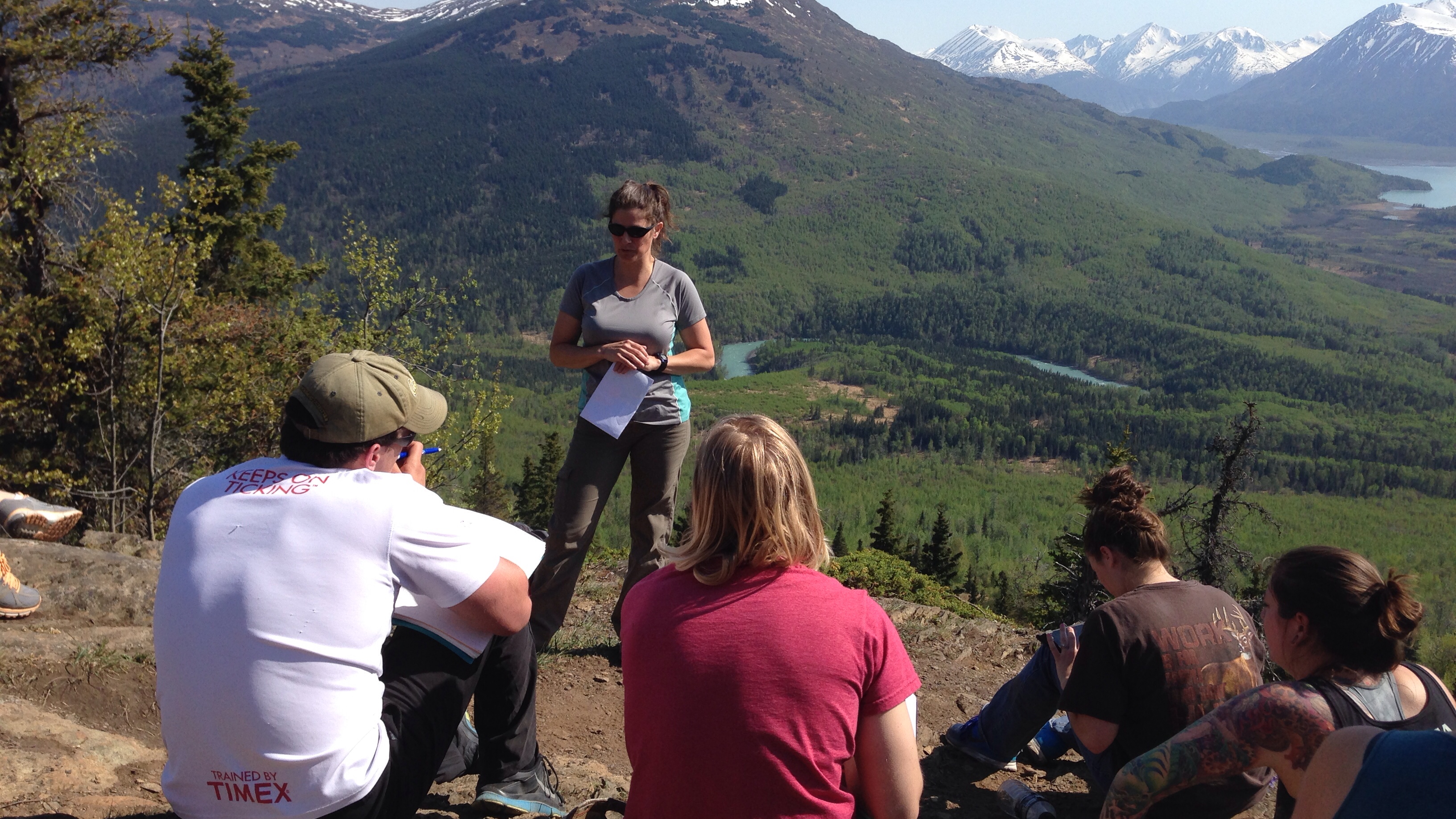 Ecologist Elizabeth Bella discusses how recent wildfires had changed the landscape with UAF students on a natural resources field tour. They were hiking in the Skilak Wildlife Recreation Area.