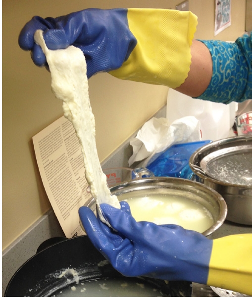 Stretching the Curds Bowl of curds on table