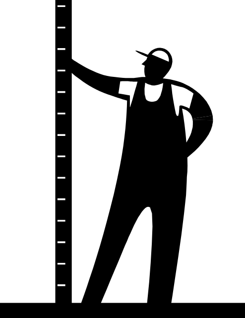 Man holding up a measuring tool