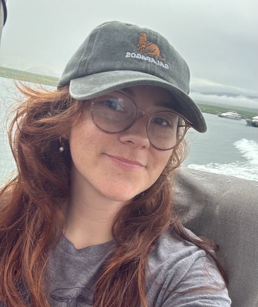 London Purcell in a skiff on water