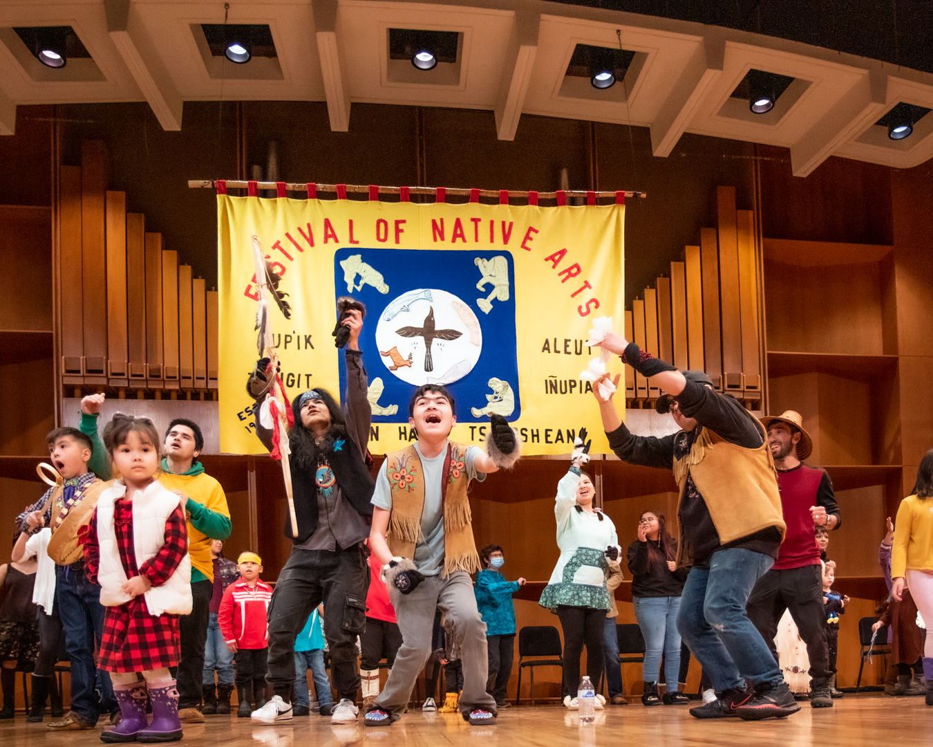 UAF Troth Yeddha' Dance Group performs on stage in the Davis Concert Hall | UAF Photo