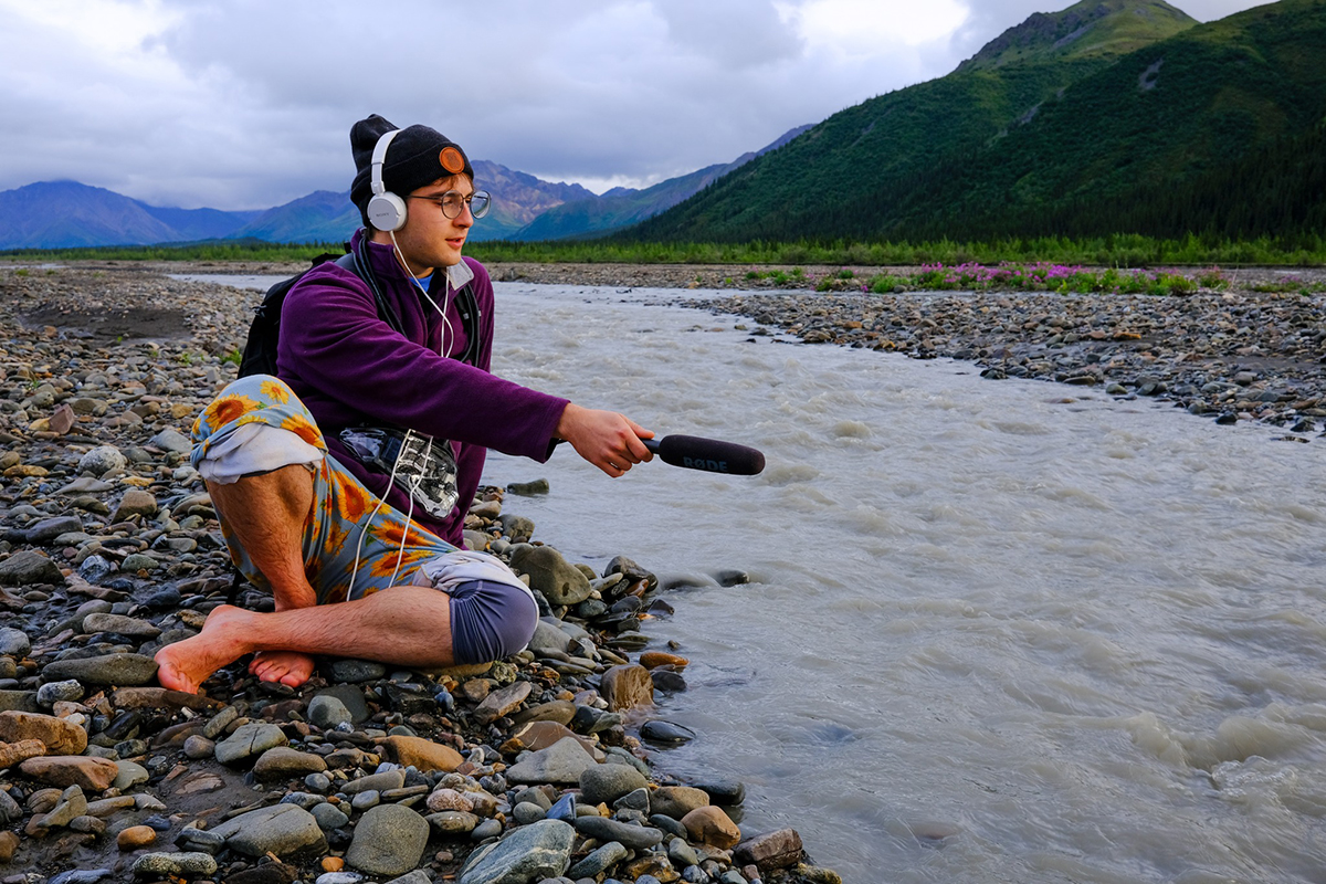 Seamus Knight records the sounds of the Braided River. Photo credit: Composing in the Wilderness