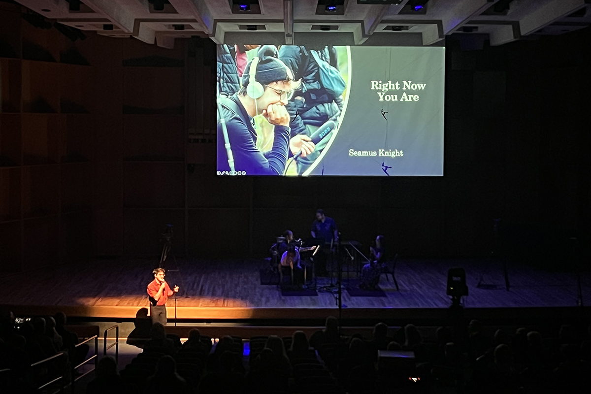 Seamus Knight introduces his original composition, Right Now You Are, ahead of its final performance by the ensemble CORVUS. Photo credit: Sarah Manriquez