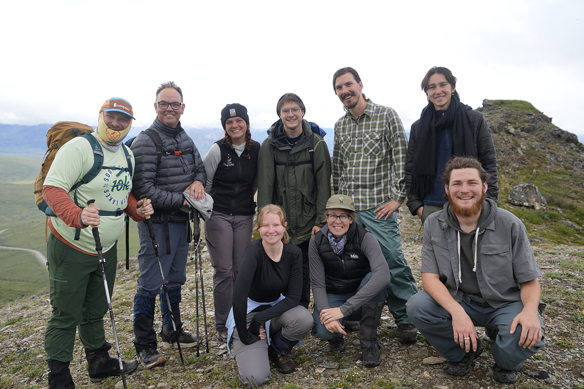 Composers and guides in the 2025 Composing in the Wilderness cohort gather for a group photo in Denali National Park. Photo courtesy of Knight