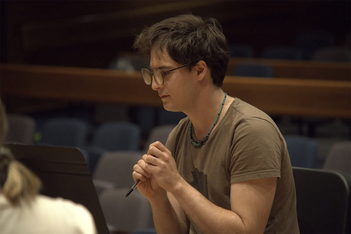 Seamus Knight during his 40-minute rehearsal with the professional ensemble CORVUS, preparing for the premiere of his original composition.. Photo courtesy of Knight