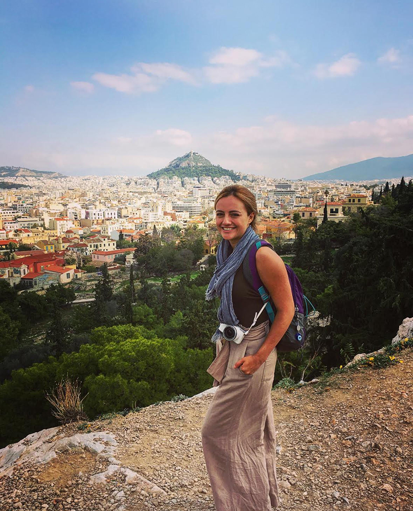 Anne Moore poses at a scenic overlook in Athens, Greece. Photo courtesy of Anne Moore.
