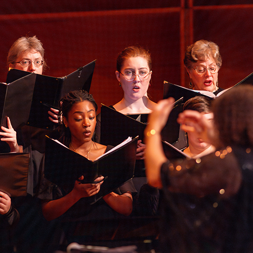 The UAF Choir of the North hosts their holiday concert and fundraiser in the Davis Concert Hall and Fine Arts Building, Saturday, Dec. 7, 2024. The choir was under the direction of Dr. Jaunelle Celaire with Loylene Ruppert on piano. (UAF photo by Leif Van Cise)