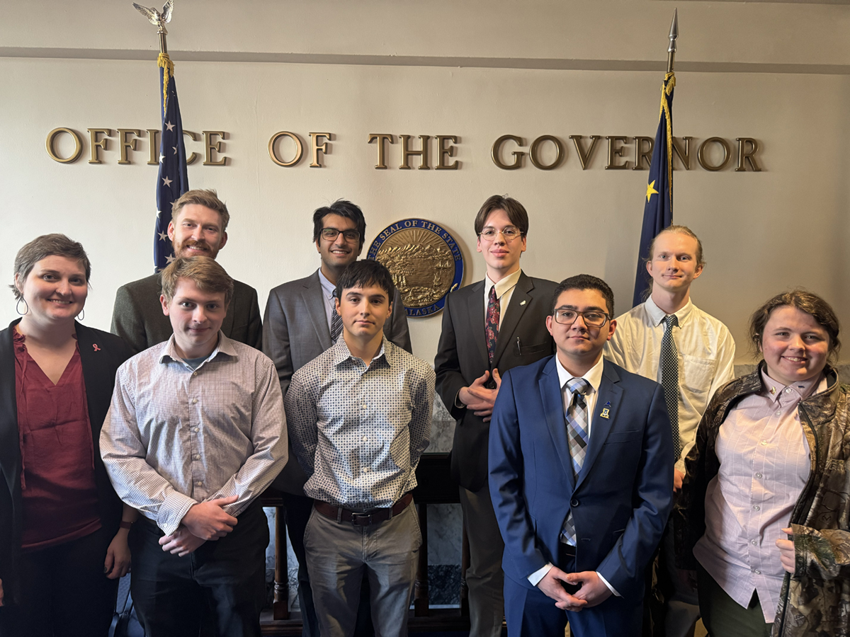 Climate Scholars posing in front of the Governor's floor. Photo credit: Eleanor Guthrie