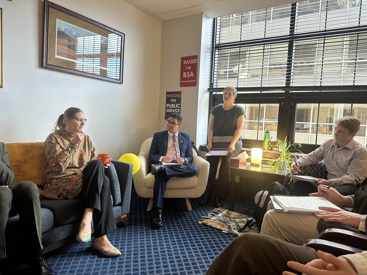 Regent Escobar and climate scholars interacting with Representative Ashley Carrick of House District 35. Photo credit: Kaitlynne Rice