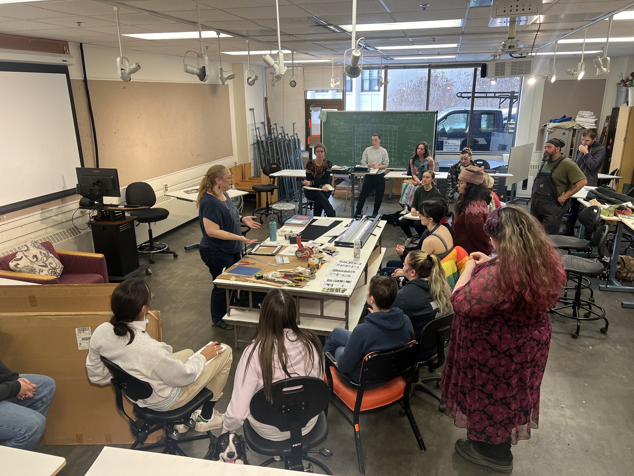 Allison Juneau runs a matting demo in October 2024. Photo courtesy of Abby Druckenmiller.