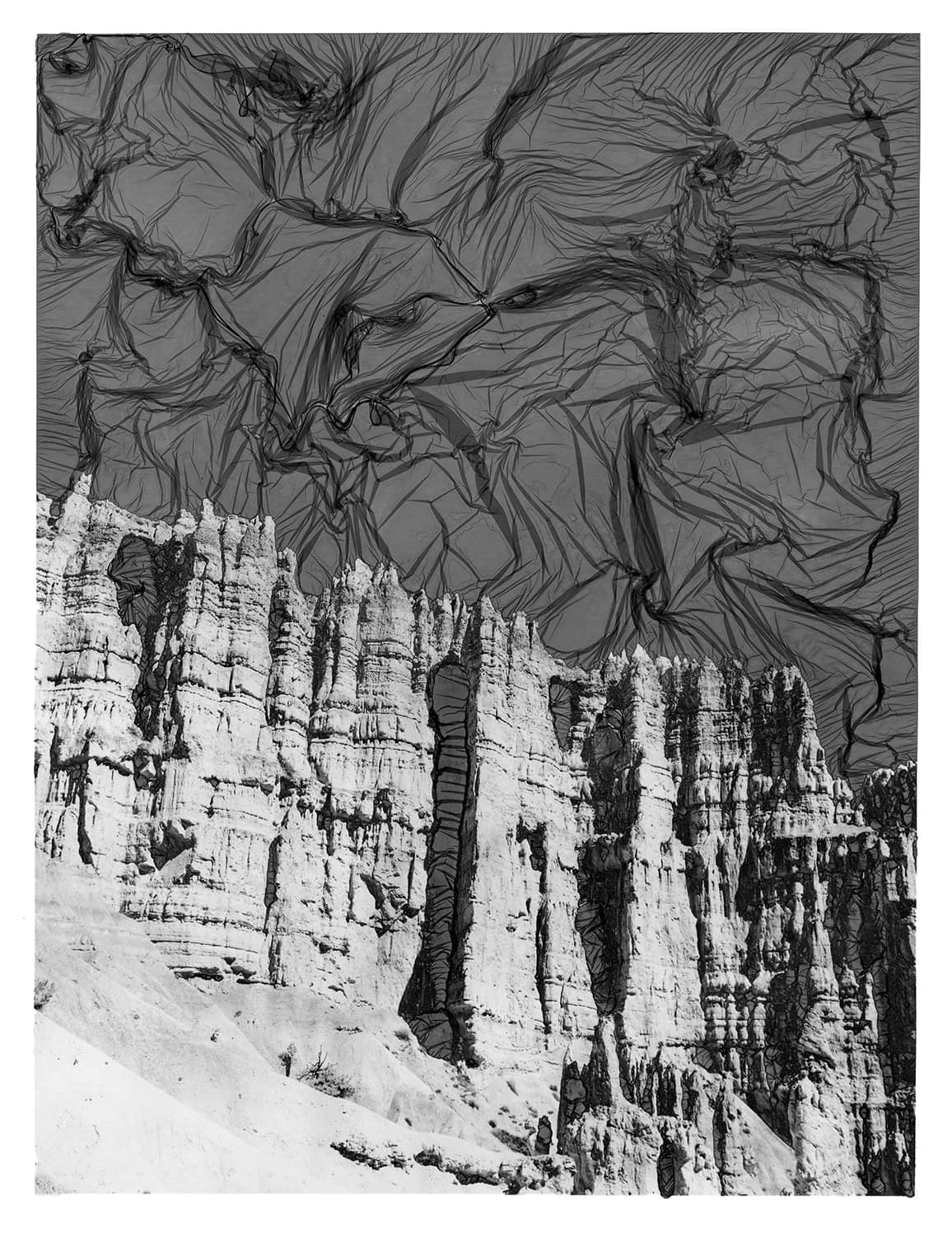 Black and white mordançage image of a cliff face in Utah by J. Jason Lazarus