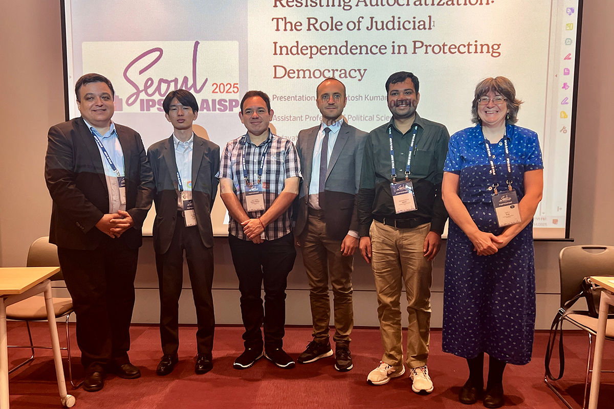 Carol Gray with speakers from Resisting Autocratization: The Role of Judicial Independence in Protecting Democracy. Photo courtesy of Carol Gray.