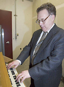 David Stech plays the carillon. UAF Photo by Todd Paris, 2005.
