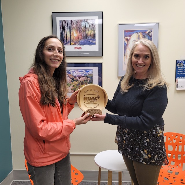 Hutchquist is awarded the 2022 Spirit of KUAC Award from General Manager Gretchen Gordon.