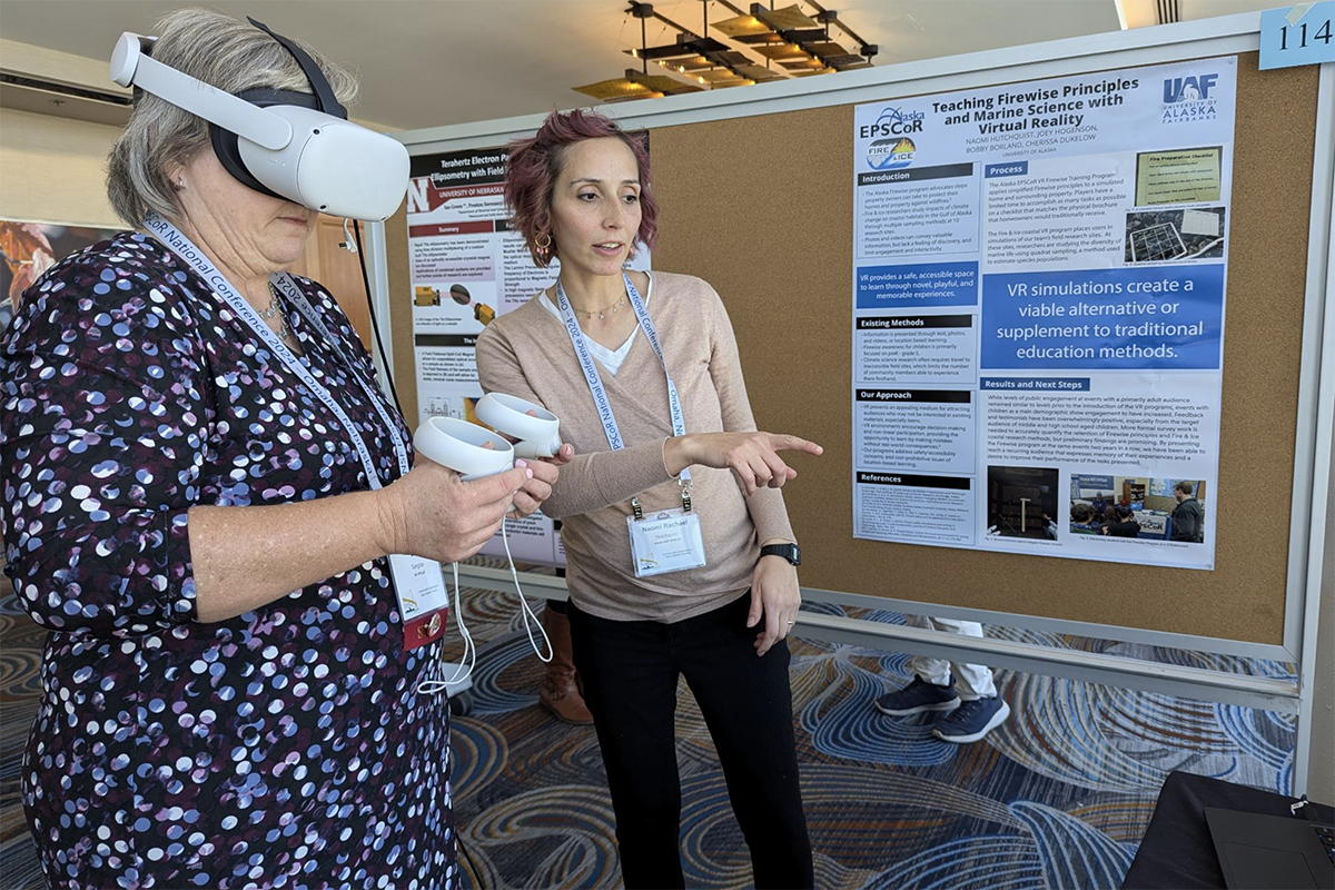 As a Data Visualization Specialist with Alaska EPSCoR, UAF alumna Naomi Hutchquist (’19) demonstrates her VR project on Firewise principles and marine science at the 2024 NSF EPSCoR National Conference. Photo credit: Alaska EPSCoR