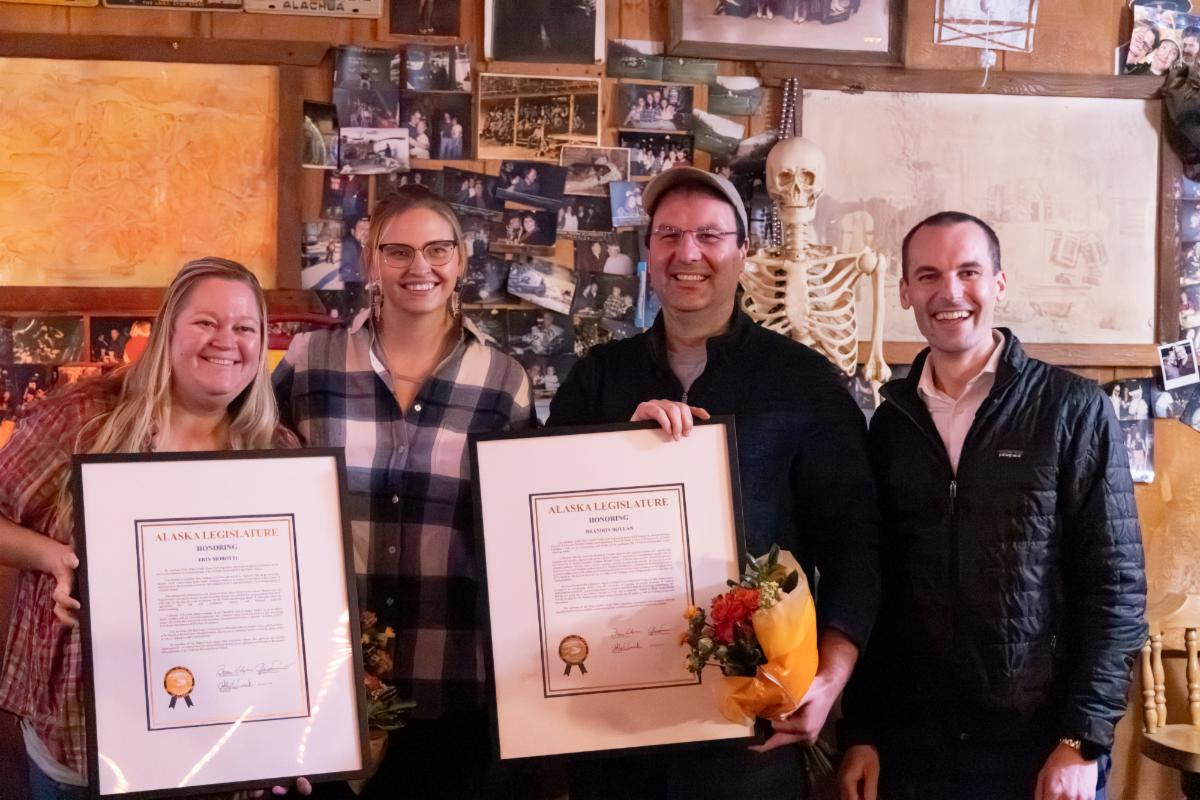 Brandon Boylan (center right) and Erin Morotti (center left) pose with Rep. Ashley Carrick (second from left) and Rep. Calvin Schrage (far right) after receiving Alaska State Legislature citations in Fairbanks.