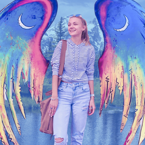 Gabby Petito poses in front of a colorful mural in Old Colorado City in 2019; the wings have become a symbol of her memory. Photo credit: Gabby Petito Foundation