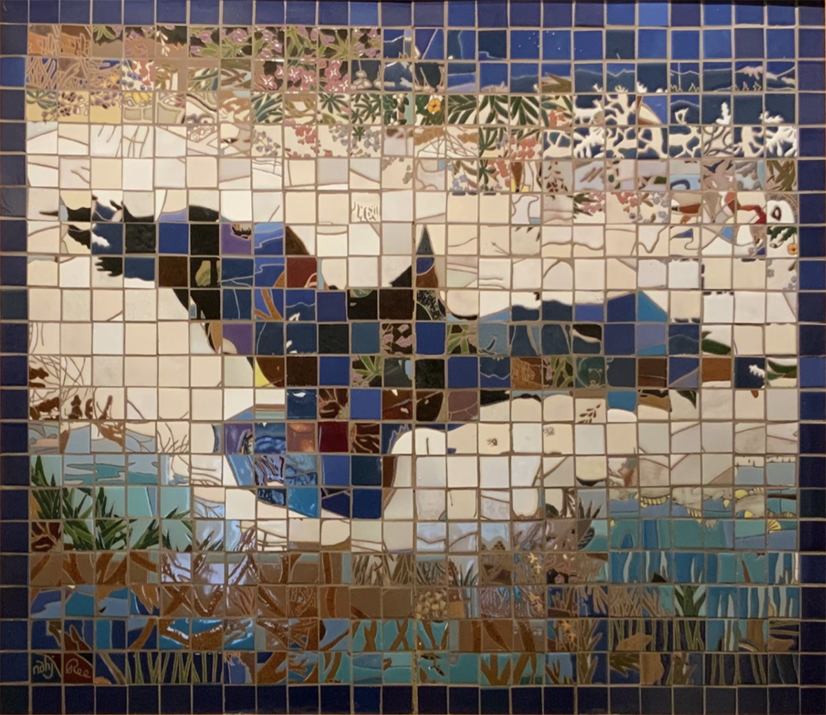 Tile mosaic featuring a dark bird with open wings. Photo courtesy of Hausle-Johnson