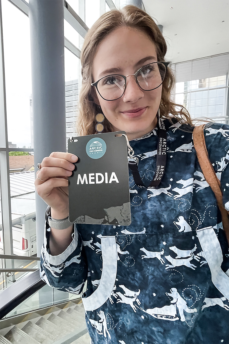 Lizzy Hahn displays a media badge at Arctic Encounter. Photo courtesy of Hahn