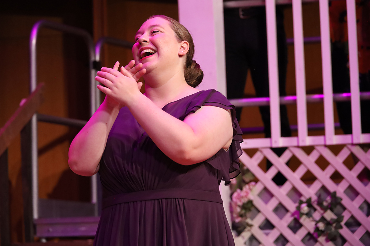Olivia Buzby sings on stage during the 2026 Fairbanks Summer Arts Festival performance. Photo courtesy of Jaunelle Celaire.