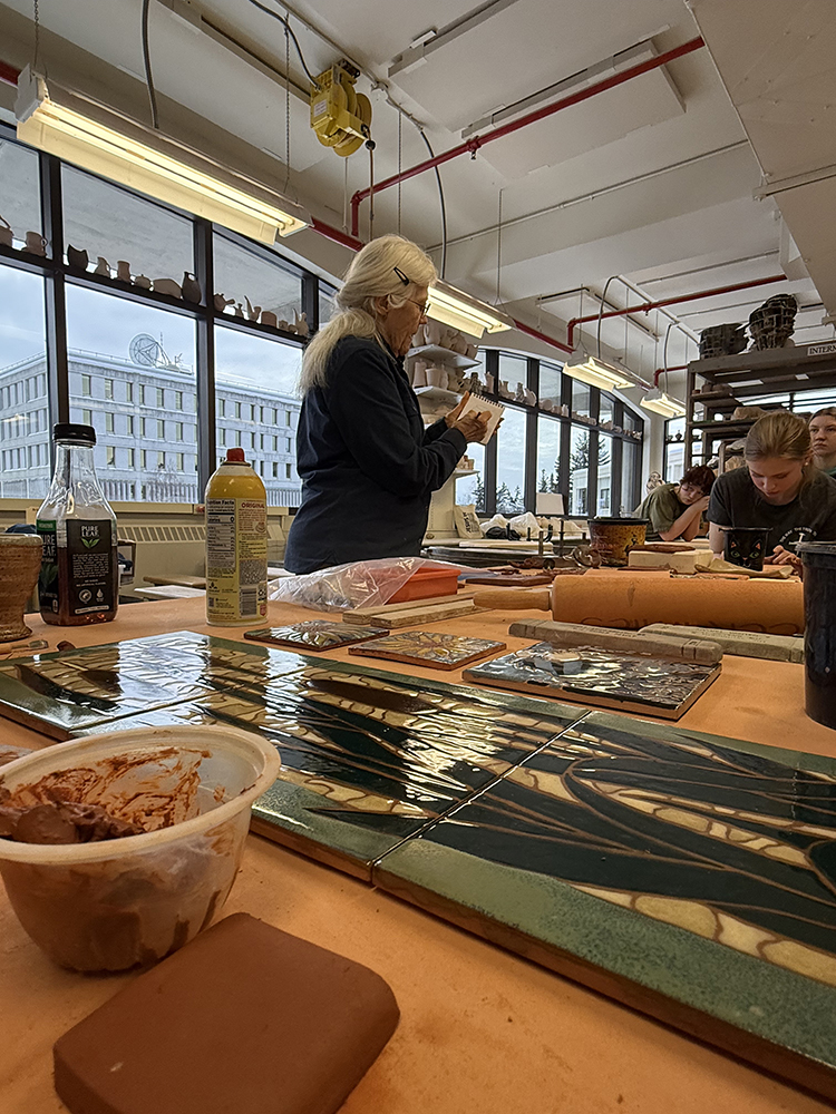 Nancy Hausle Johnson introduces her process during her workshop in the UAF Ceramics studio.