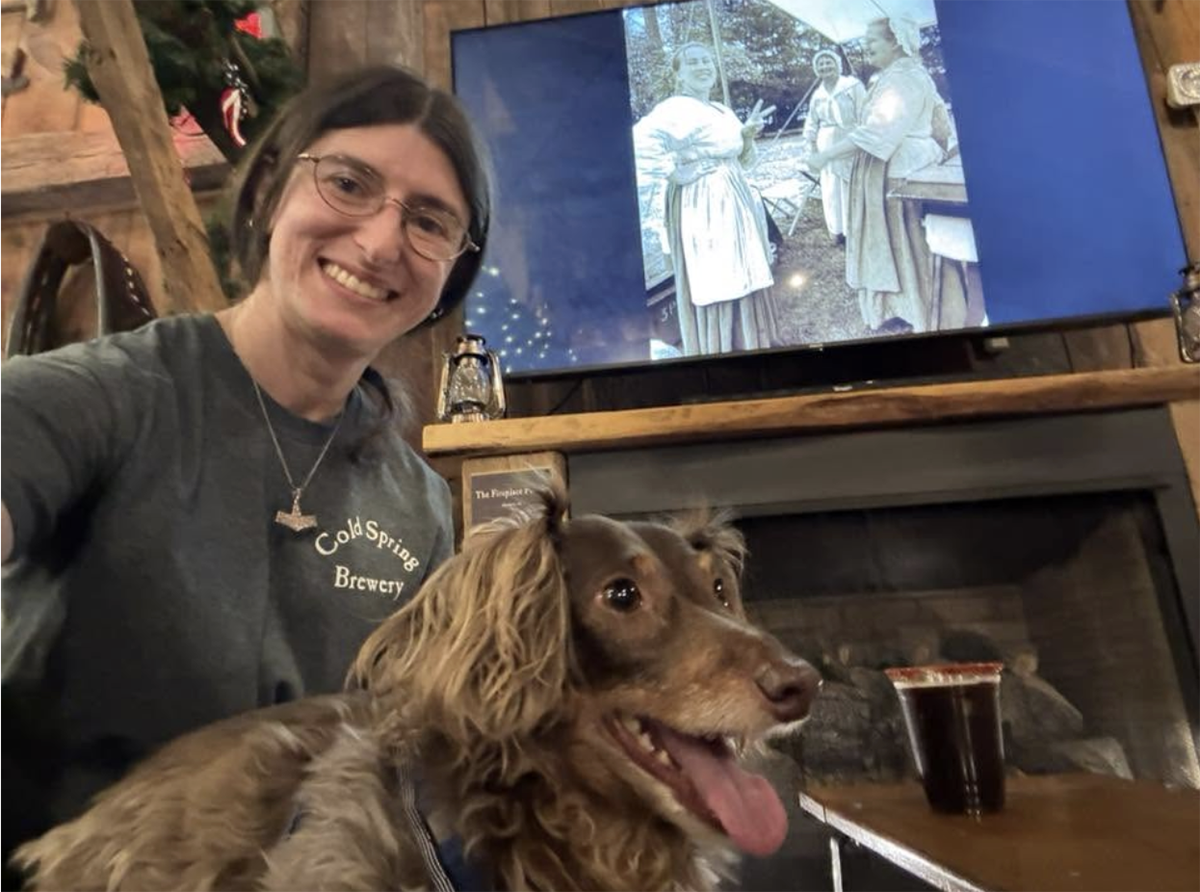 Taran Christen poses with pup, Miss Heidi, at Cape May's Cold Spring Brewery. Photo courtesy of Taran Christen.