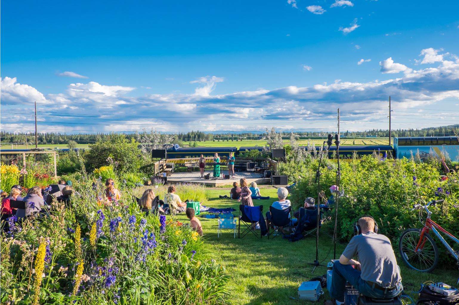 Local musicians perform during a summer concert series in the Georgeson Botanical Garden on the Fairbanks campus.