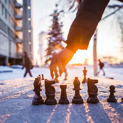 Students Rachael Teter and Jasmine Jemewouk play an impomptu game of chess at -18 degrees. UAF Photo by JR Ancheta
