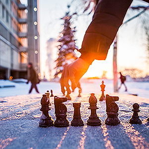 Sunset on a snow covered chess board