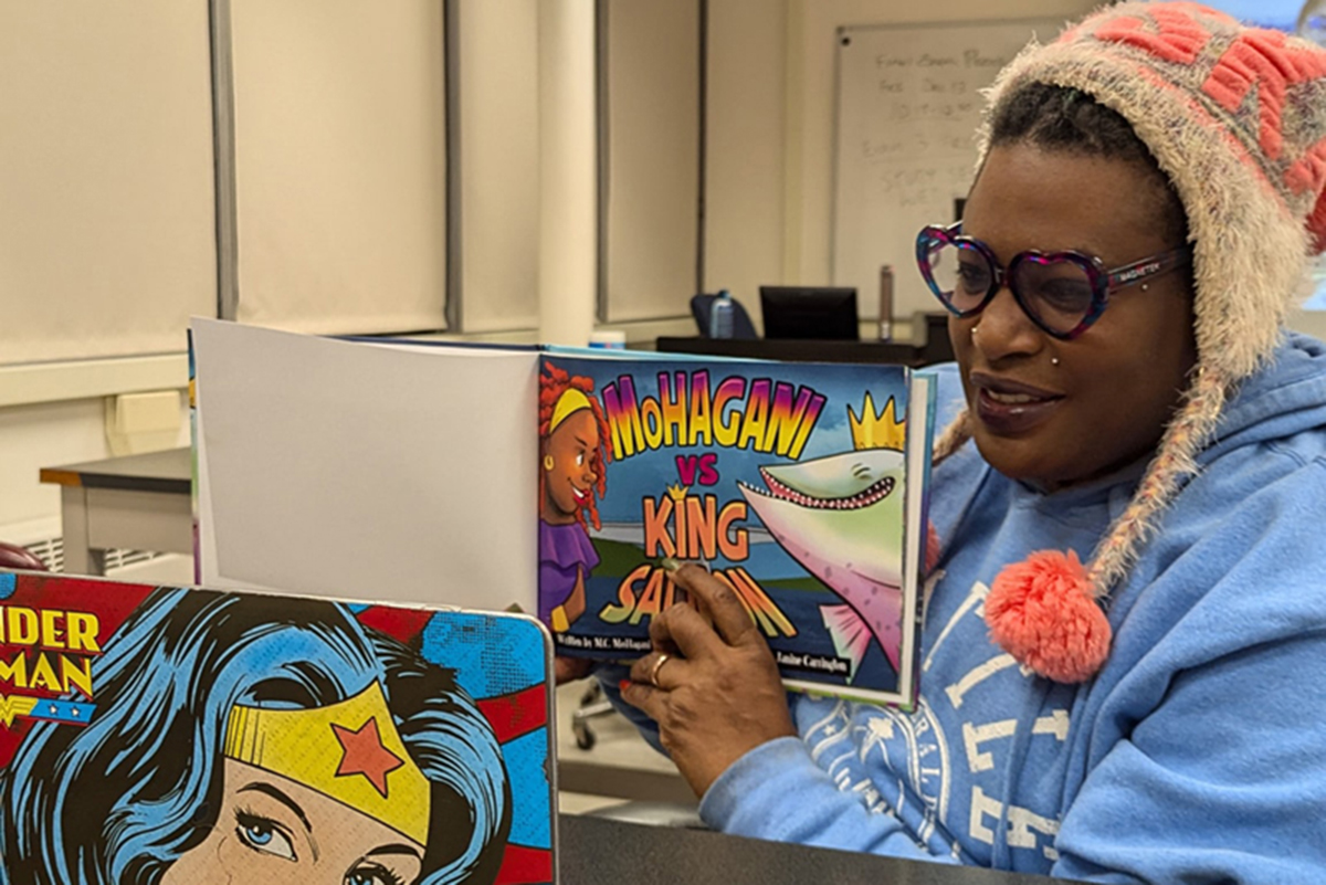 MoHagani Magnetek reads her book MoHagani vs King Salmon to an audience via Zoom. Photo courtesy of the UAF Department of Anthropology