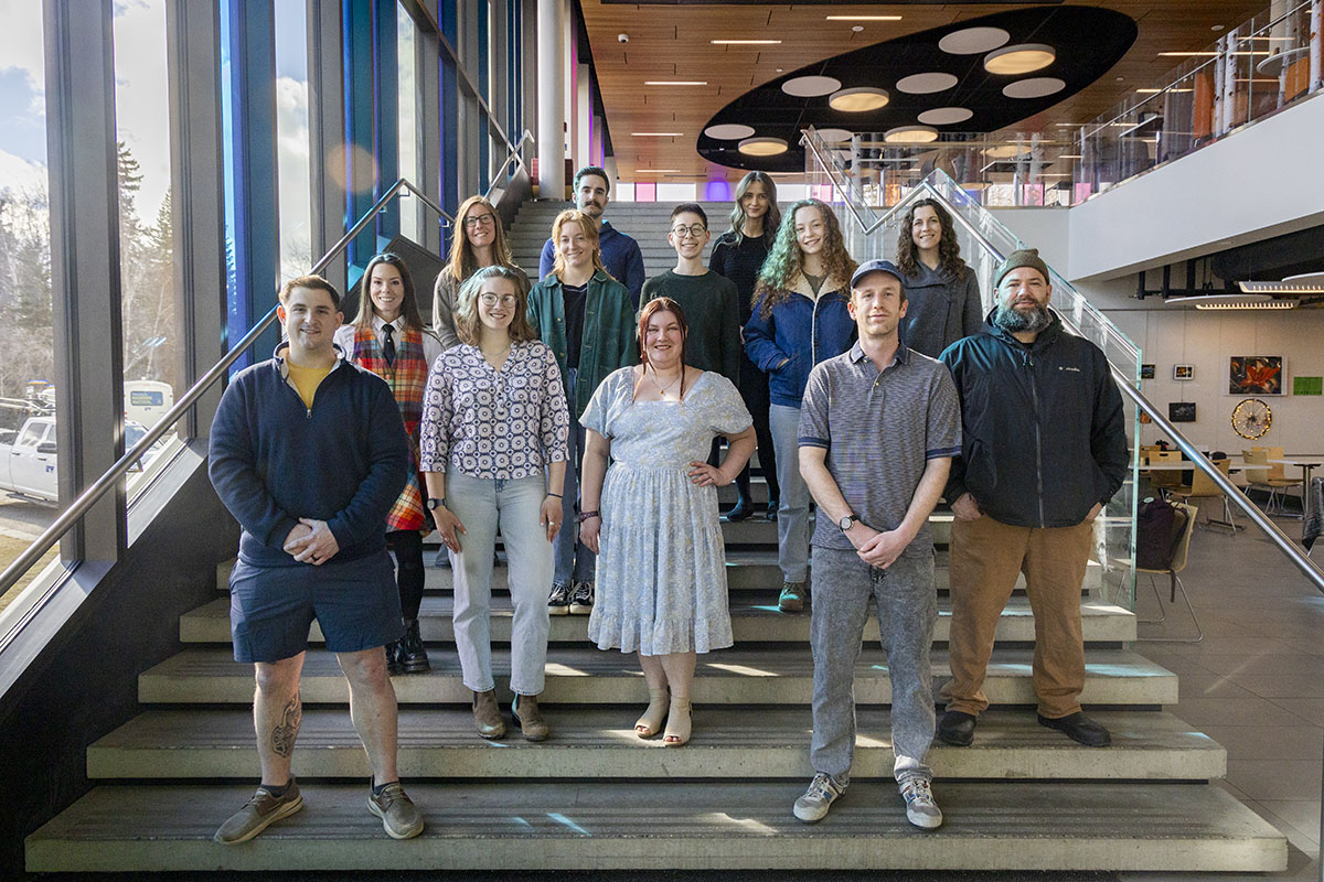 Some of the recipients of the UAF College of Liberal Arts' Outstanding Student Award for the 2024-2025 academic year gather on the Dine 49 steps in Wood Center on April 18, 2025. From left, bottom row, are Patrick Deslaurier, Trevor Chrzan; second row, Lizzy Hahn, Kjrsten Schindler, Kevin Carroll; third row, Sarah Dexter; fourth row, Hazel Probst, Sophia Martin; fifth row, Katie Craney, Xochitl Martinez, Jaylon Pate; top row, Ben Lucia, Evelina Savonin. UAF Photo by Leif Van Cise
