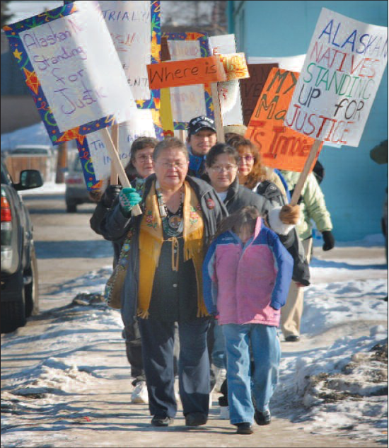 The late Shirley Demientieff leads 2003 protest march in support of the four men convicted of murdering John Hartman in October 1997